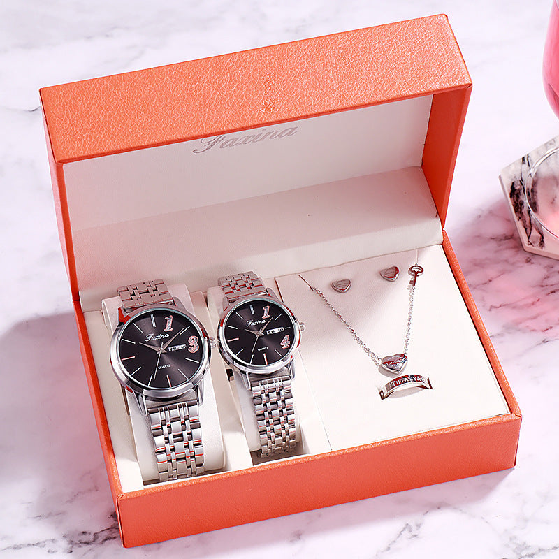 Watch and jewelry gift set featuring elegant watch and heart-themed jewelry in a stylish orange box.